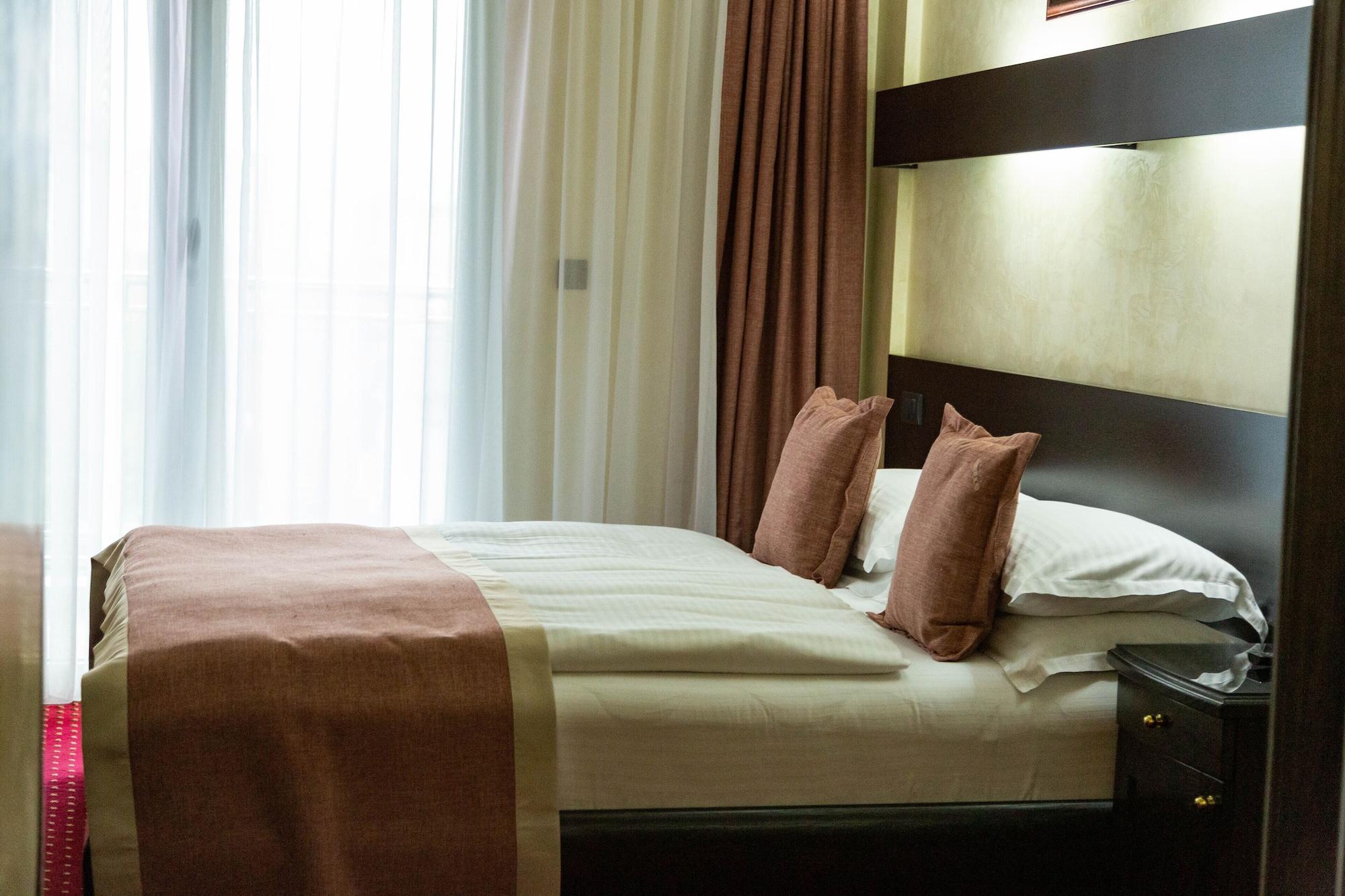 Prezident Hotel Novi Sad Exterior foto A bed